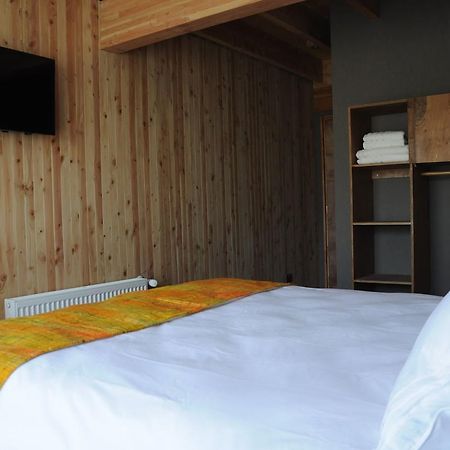 Hostal Buena Tierra Пукон Экстерьер фото